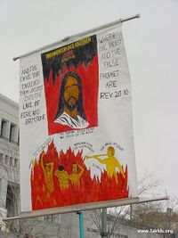 A protester at the April 2003 LDS General Conference attempts to convince others that members of the Church do not believe in the Biblical Jesus. Members of the Church may believe some different things about Jesus, but this does not mean they worship a different being than the protester.