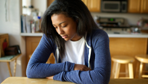 a young woman praying