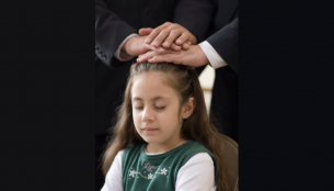 a young girl receives the gift of the Holy Ghost